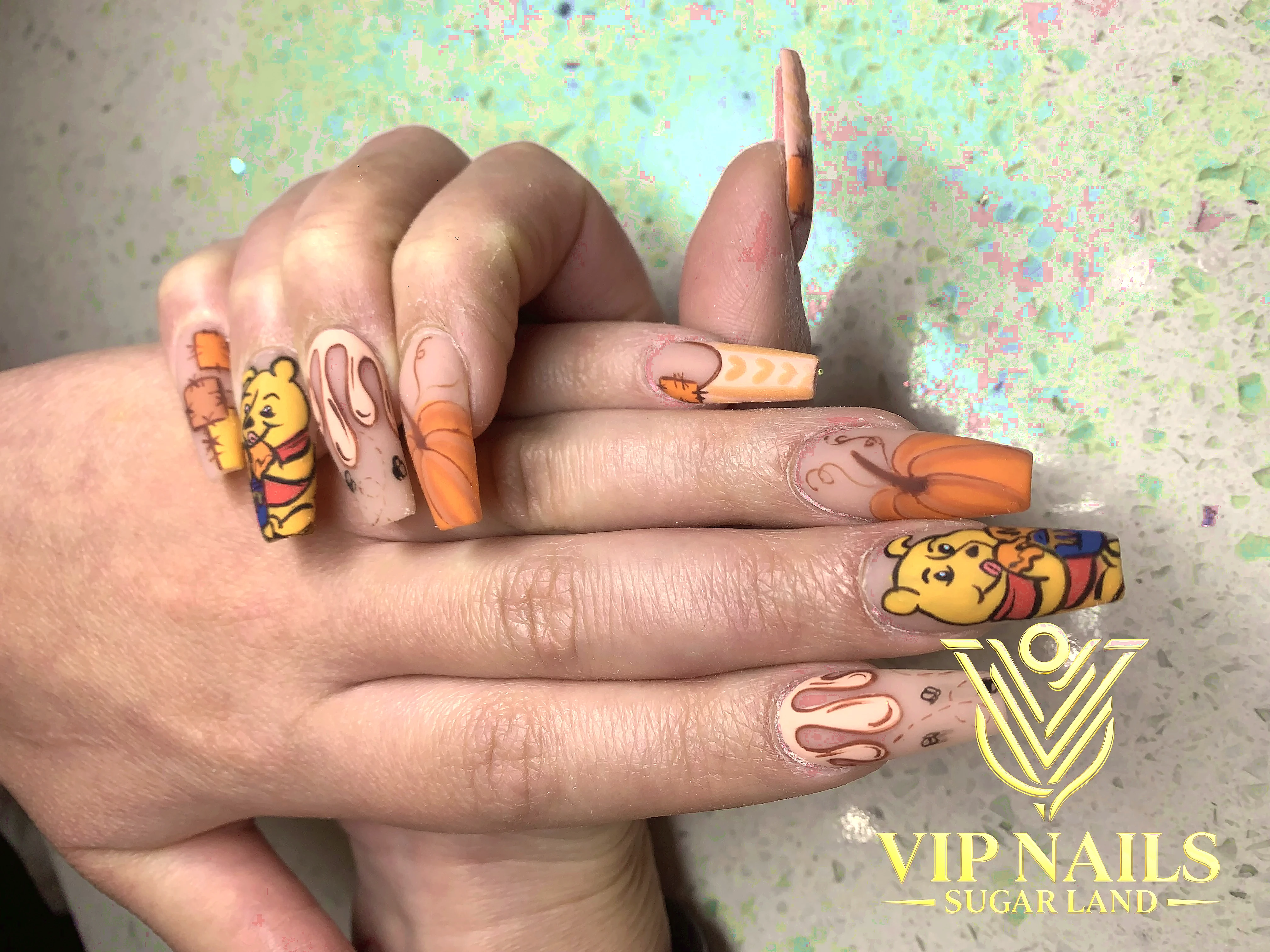 XL custom nail art with champagne glam accents