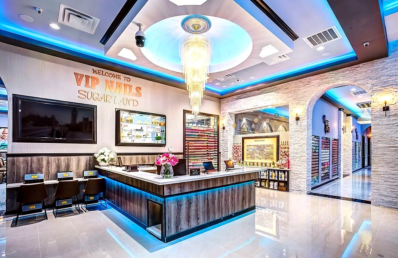 Lobby reception and WELCOME TO VIP NAILS SUGAR LAND wall