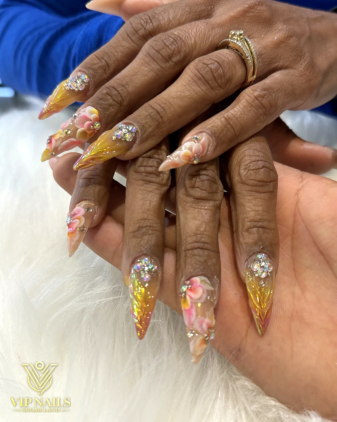 Long stiletto acrylic set with encapsulated gold glitter by VIP Nails Sugar Land