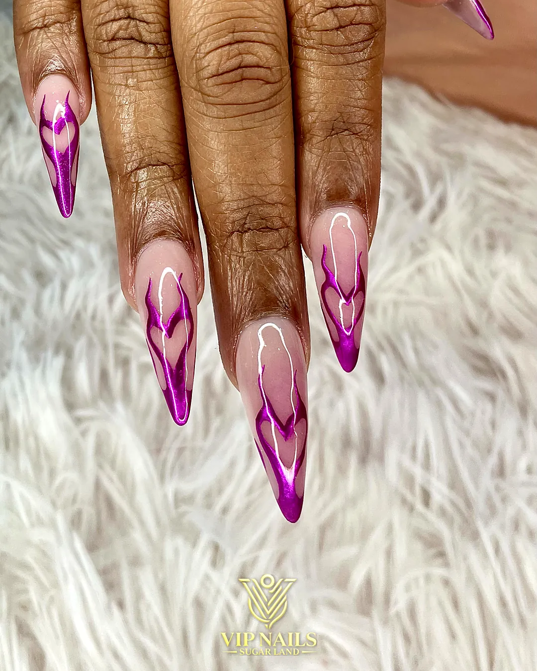 Long nude stiletto acrylic set with purple flame French tips by VIP Nails Sugar Land
