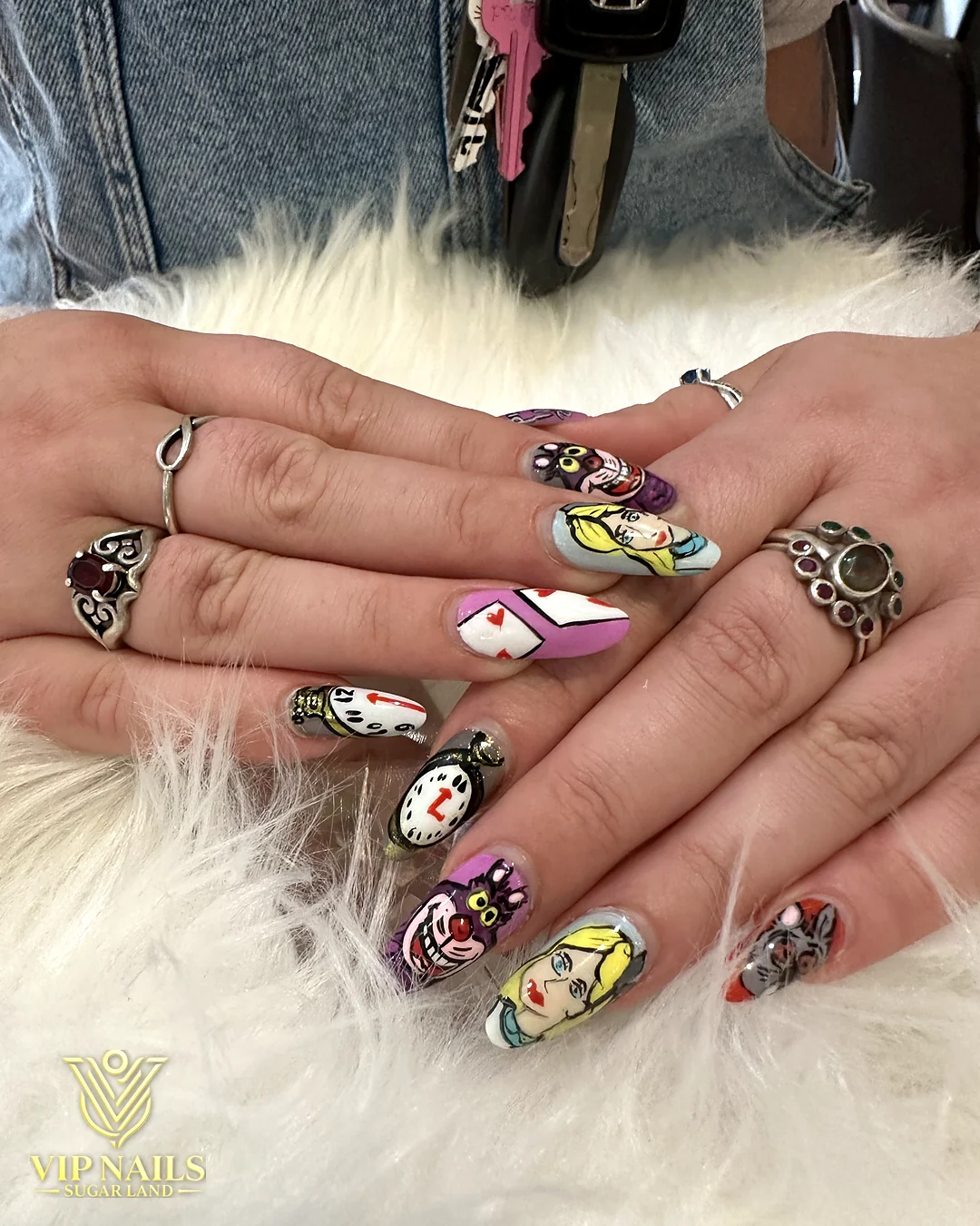 Medium squoval nails with hand-painted cartoon character art by VIP Nails Sugar Land