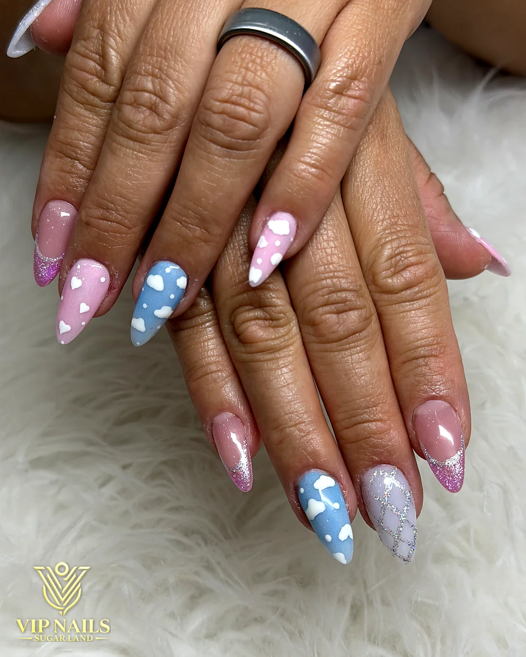 Pastel almond nails with hand-painted cloud art by VIP Nails Sugar Land