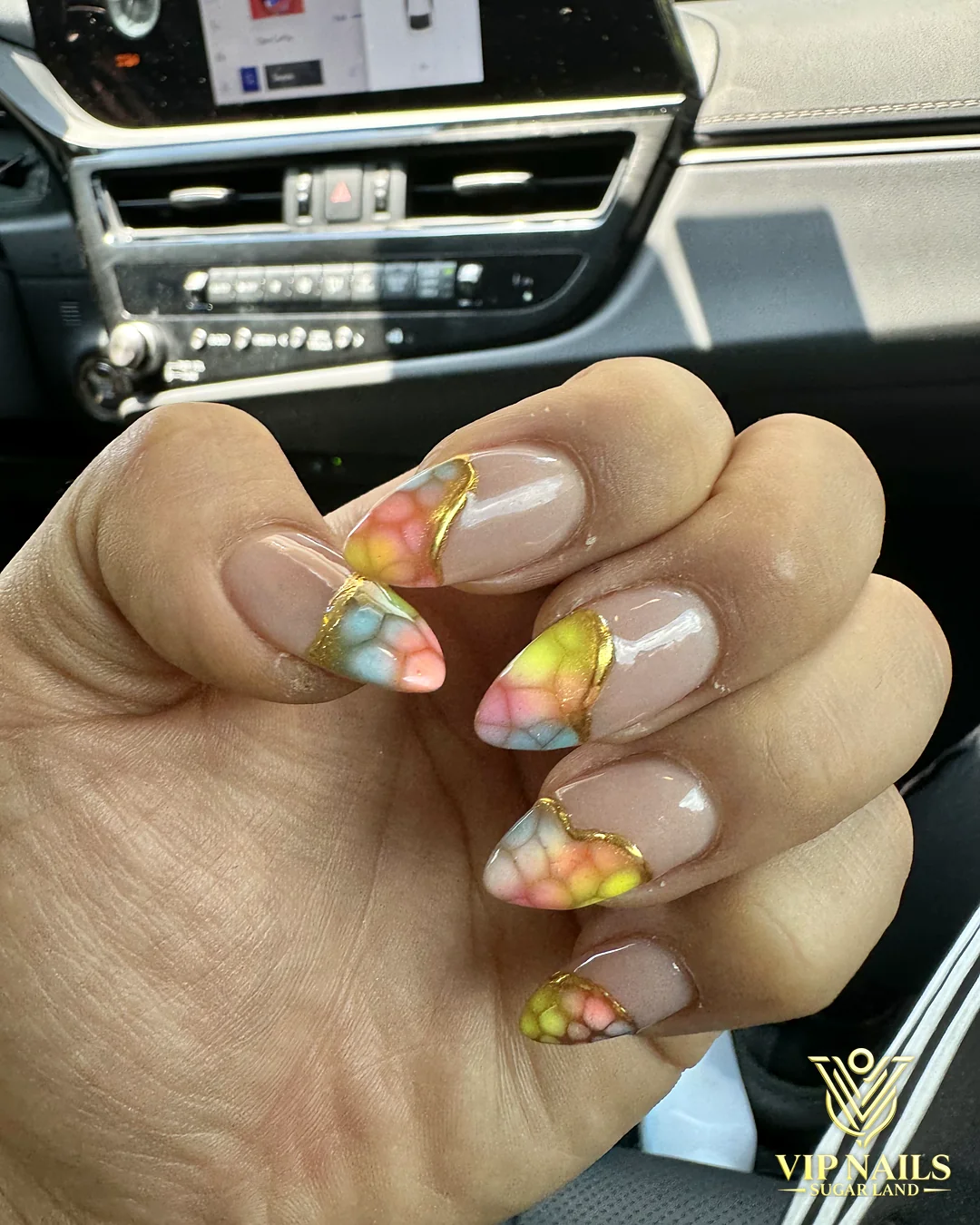 Nude almond nails with hand-painted multicolor jelly art by VIP Nails Sugar Land