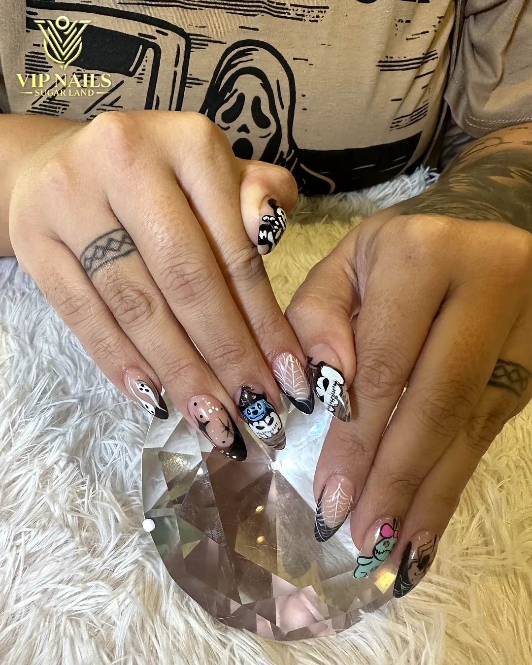 Short squoval nails with hand-painted Halloween Ghostface art by VIP Nails Sugar Land